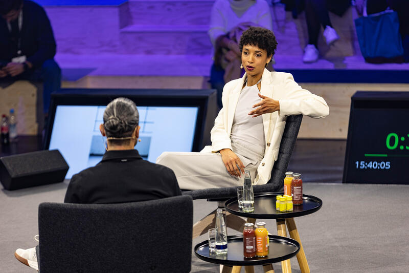 Olympiasiegerin Malaika Mihambo wird am 4.12.2024 auf der ISPO, einer Fachmesse und Business-Festival für die Sport-, Lifestyle-, Health- und Techindustrie, in München von Daniel Herzog interviewt. -- Olympic Gold Medalist Malaika Mihambo getting interviewed by Daniel Herzog at the ISPO, a trade fair and business festival fot the sports, lifestyle and tech industry, on Decmeber 4, 2024 in Munich, Germany