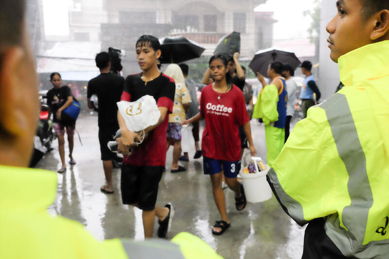Hundreds of residents of Bagong Silangan, Quezon City, Philippines, evacuate their homes due to intense flooding and rain on July 24, 2024. The state weather agency has declared Carina, internationally known as Gaemi, a super typhoon with maximum sustained winds of 185 kilometers per hour.