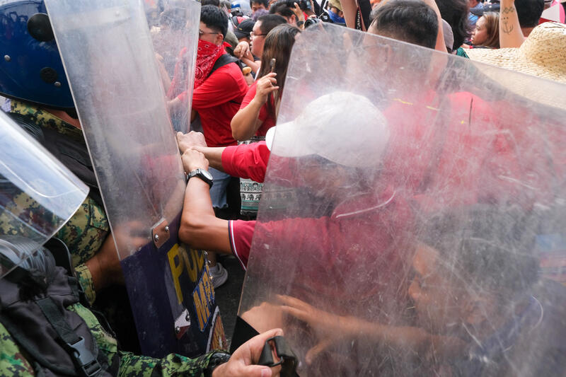 Workers and progressive groups clash with police forces during the 161st commemoration of Philippine hero Andres Bonifacio on November 30, 2024, along Recto Avenue, Manila City, Philippines.