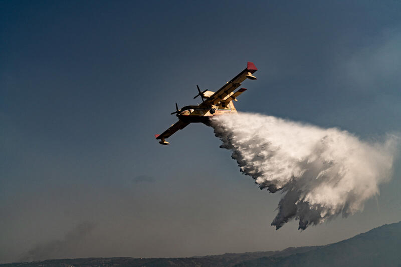 Canadair operating between the hills in Santa Venere, Reggio Calabria, Italy on July 25, 2023.